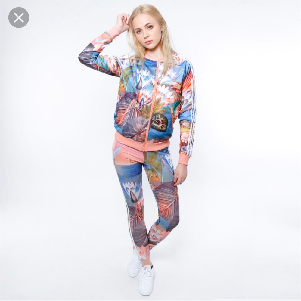 Adidas Curso 3 stripe track suit.